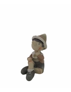 12 Statuine bimbo seduto